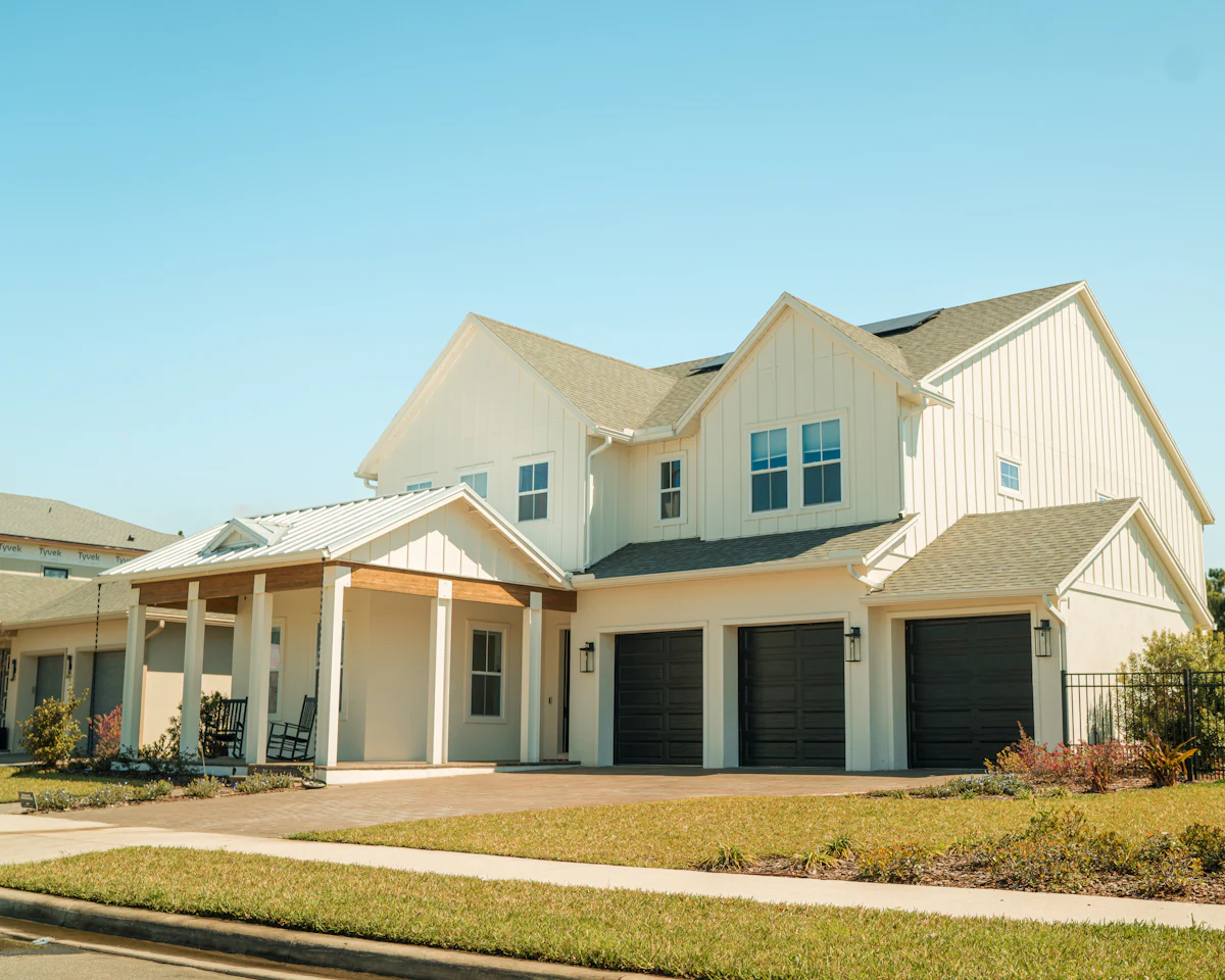 Two story factory-built home with garage and front porch